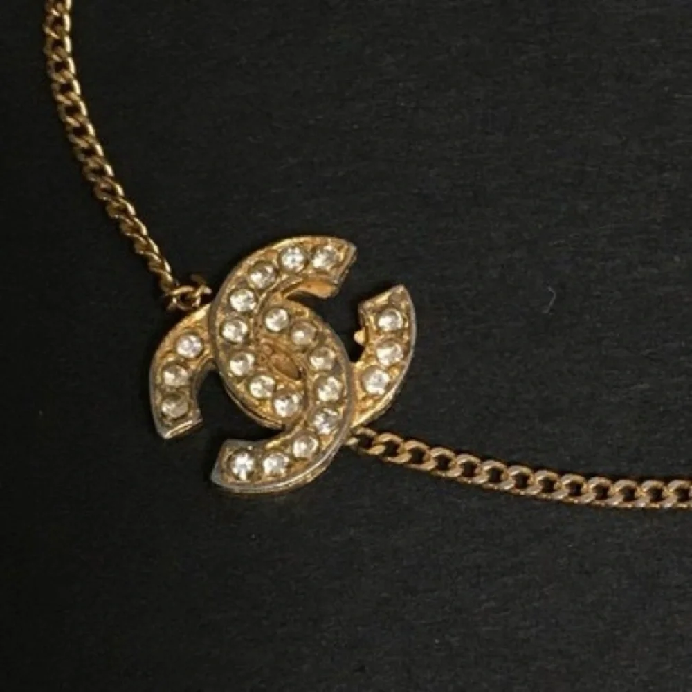 CHANEL GOLD LOGO RHINESTONE BRACELET